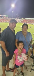 Family attending San Antonio FC soccer game